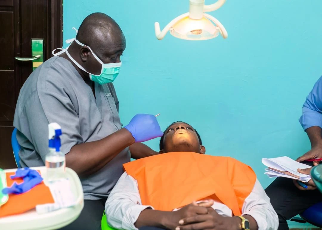 A dentist treating a patient at the Doron Medical Center dental clinic.